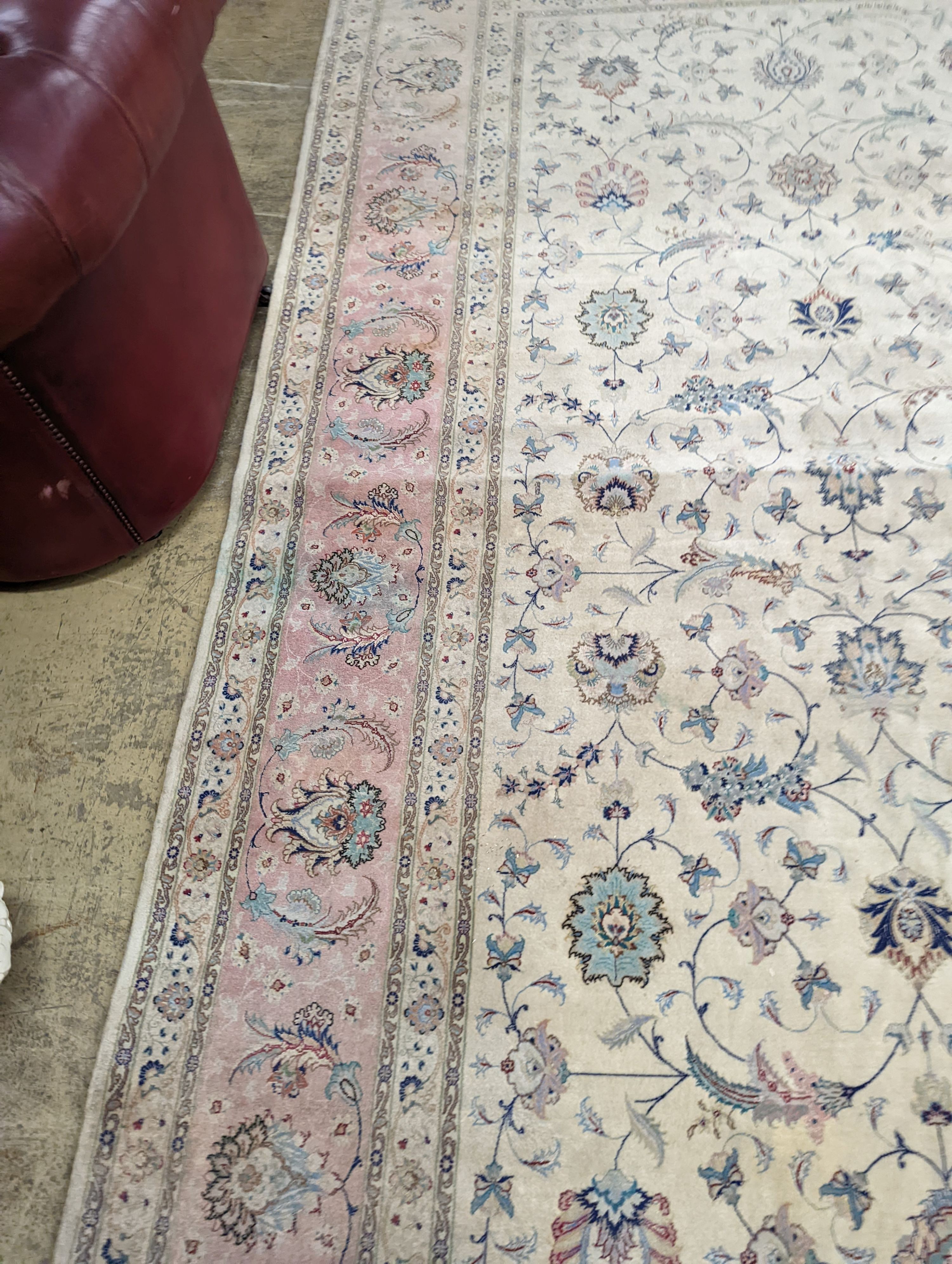 A Persian Tabriz ivory ground carpet, 410 x 300cm